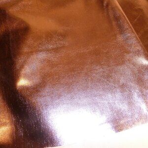 Highly shiny fabric in Pompadour pink with a matte baby pink reverse side